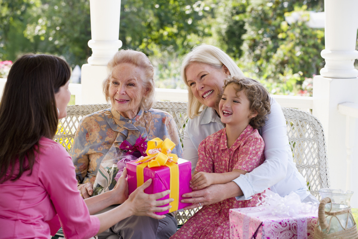 Four generations of Caucasian women at party