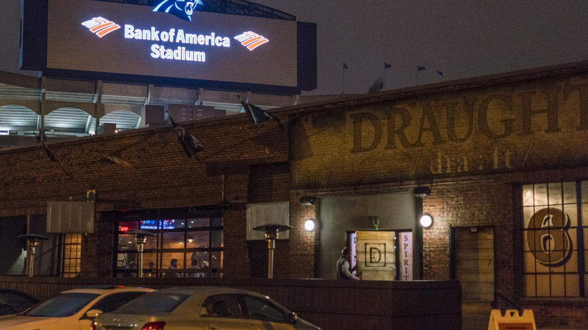 Draught stands in the shadow of Bank of America Stadium. Draught on South Cedar Street in Charlotte and All American Bar on East Bland Street in Charlotte are expecting big crowds for Super Bowl Sunday.
