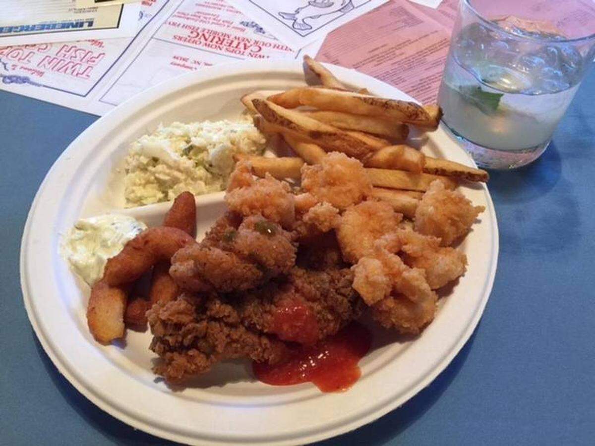 The main course at the Fish Camp Supper: Salt and pepper catfish, fried wild shrimp, hushpuppies, fries and coleslaw from Twin Tops.