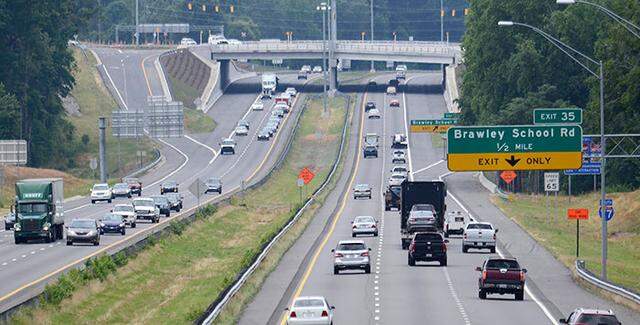 The Interstate 77 toll-lanes contractor continues to face a $30,000 daily fine, despite last Saturday’s opening of the final leg of the project, a state Department of Transportation spokeswoman said Tuesday.