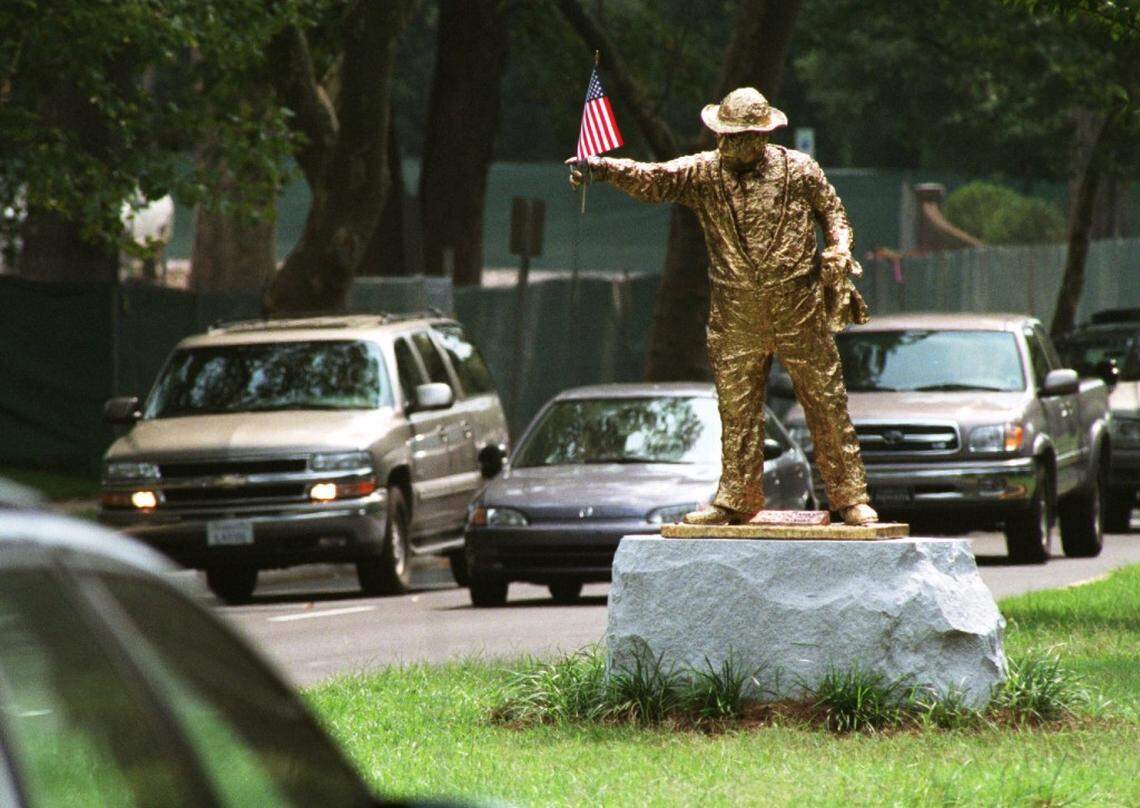 (9/14/2001) - The statue of Hugh McManaway at Providence and Queens Road sported the Stars and Stripes Friday afternoon. GARY O'BRIEN/STAFF