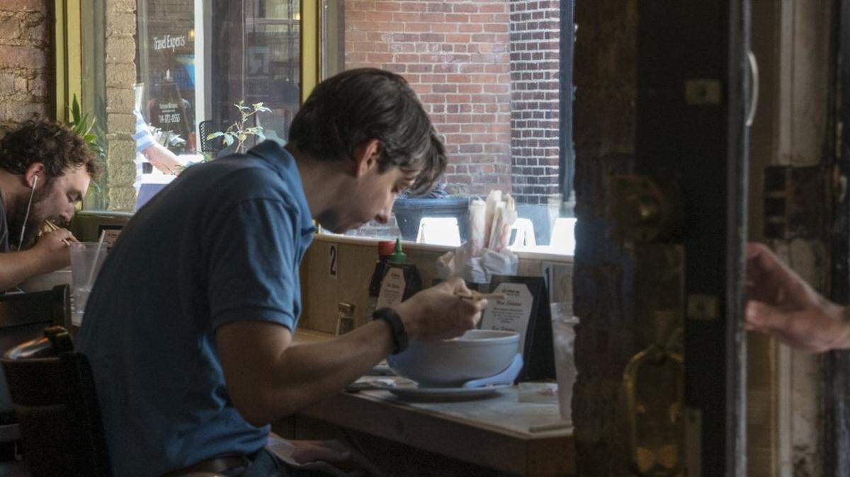 Customers enjoy lunch and a view outside at Pho in Brevard Court. With an international flavor, you can eat your way around the world at the Latta Arcade and Brevard Court.