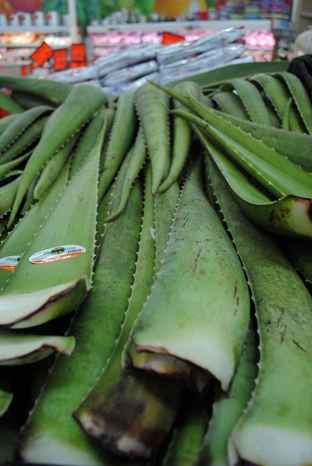 A pile of aloe rests in the produce section of the Compare Foods on North Sharon Amity Road.