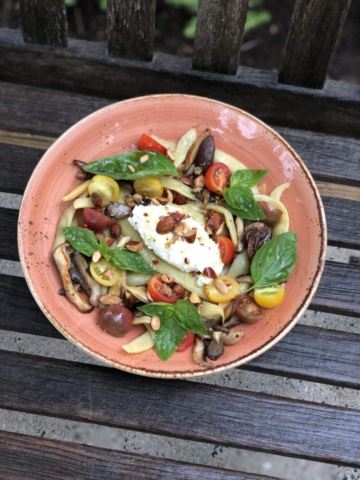 Courtesy of 300 East<br>Seasonal vegetable plate with braised dragon beans, almond ricotta, crispy mushrooms and fried almonds