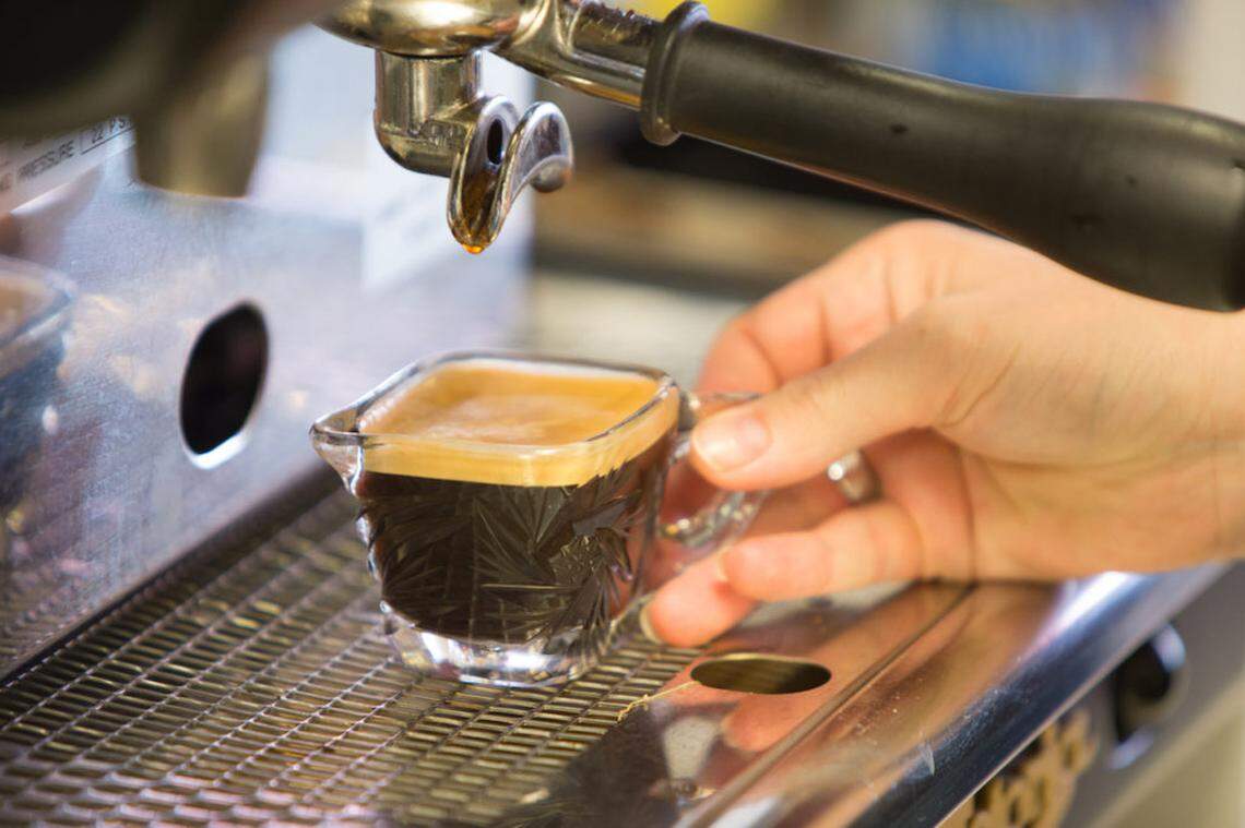 Alexis-Mizrahi-Bothero makes espresso for a lavender honey latte at Royal Cafe and Creperie. The new cafe, Crema, will also feature coffee and espresso drinks.