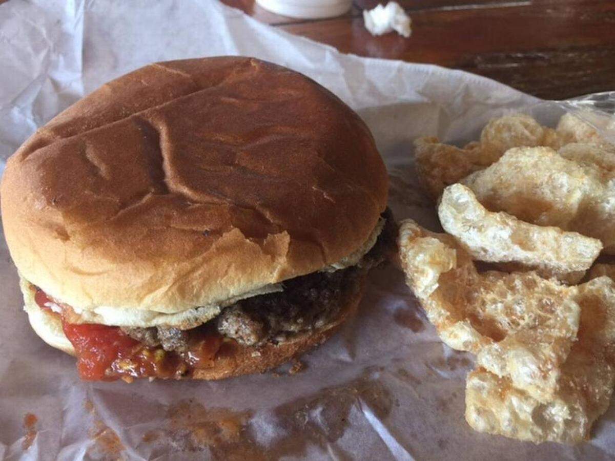 The cheeseburger at Hinson’s is simple but tasty, with housemade chili and slaw.
