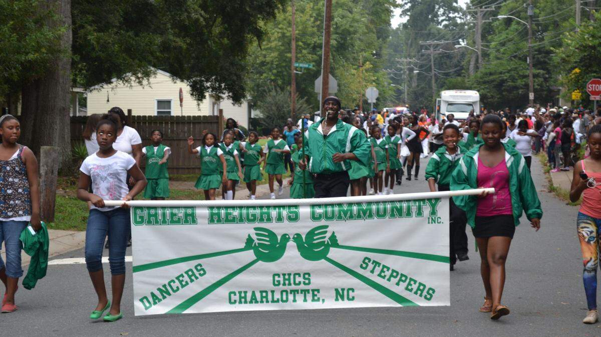 The Grier Heights Community Dancers and Steppers participate in the Grier Heights Labor Day Parade. Gary Schwab