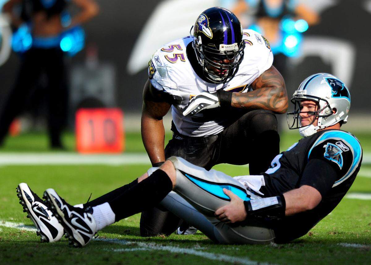 Baltimore's Terrell Suggs (55) checks the status of Panthers quarterback Brian St. Pierre after pressuring him on a pass.JEFF SINER - jsiner@charlotteobserver.com