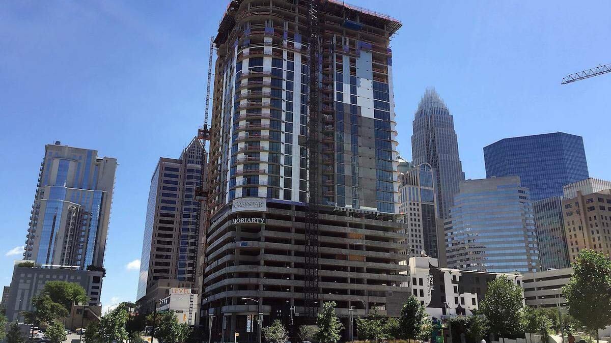 Construction continues at the Ascent apartments, across from Romare Bearden Park at Third and Poplar streets in uptown Charlotte on Thursday, July 28, 2016.