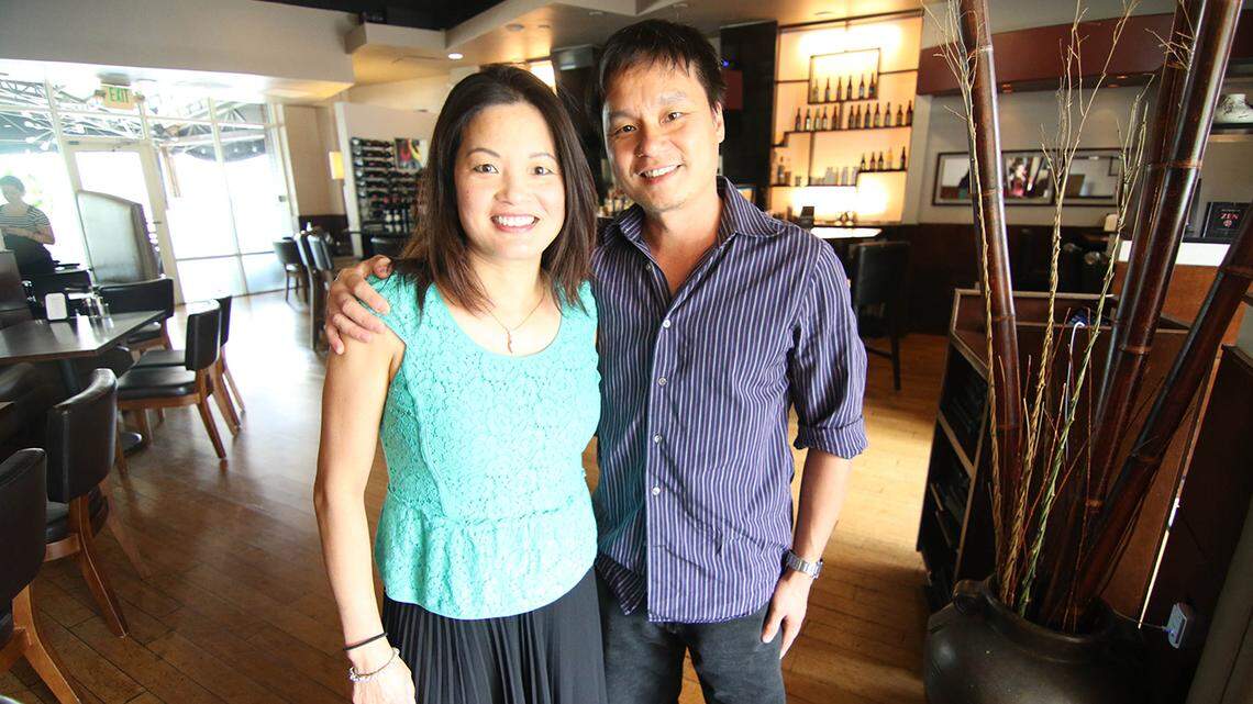 Jenny Luong of Zen Asian Fusion with her brother Chi Zhang. Zhang owns Persuasian Restaurant.
