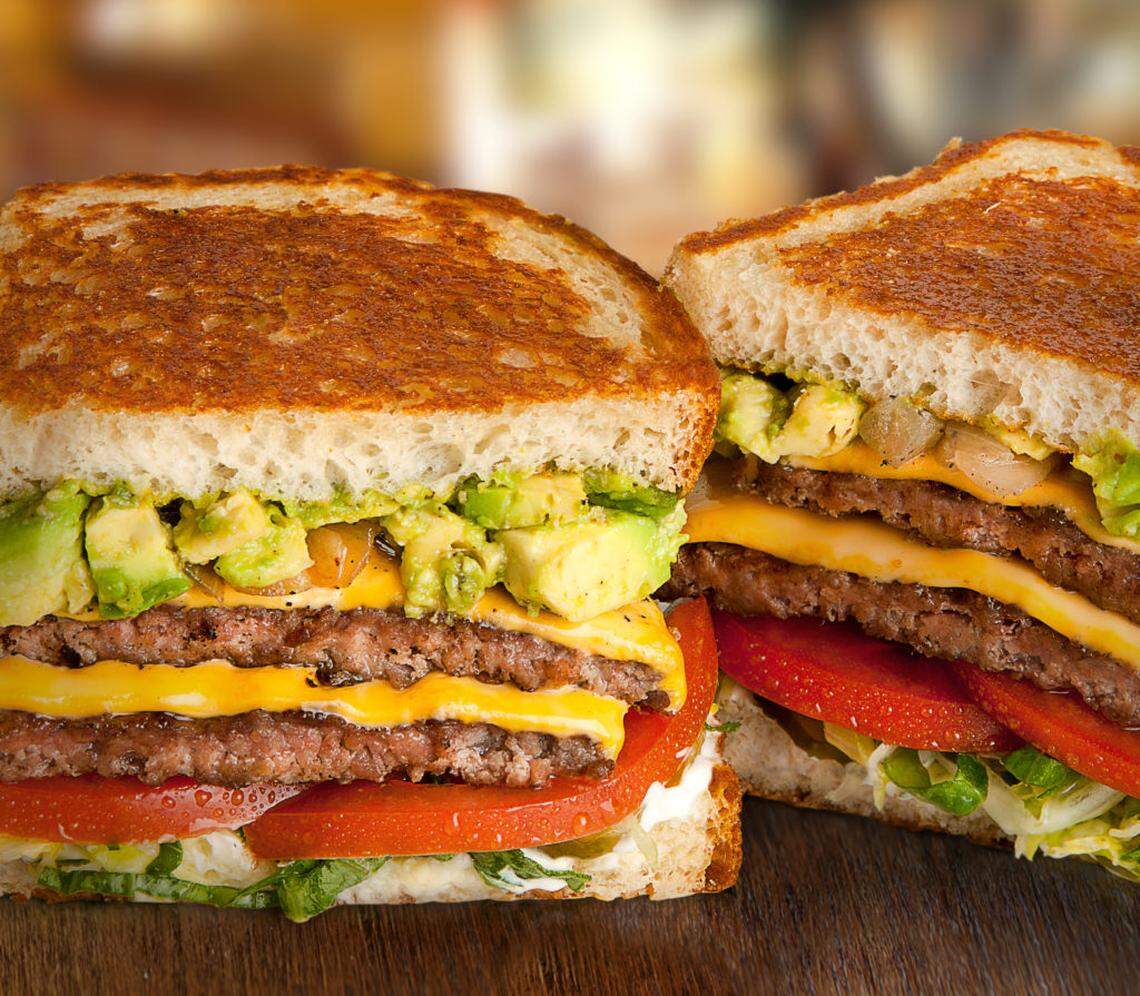 The Habit Burger Grill’s Santa Barbara Charburger is a menu favorite with two chargrilled beef patties, avocado, caramelized onions, American cheese, lettuce, tomato, pickles and mayo on grilled sourdough.