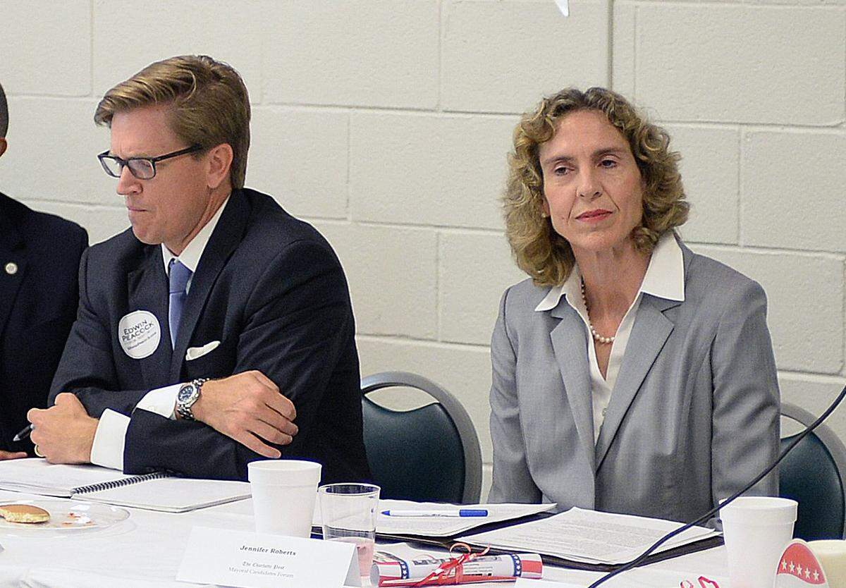 Edwin Peackock III pictured here in an Observer file photo next to Jennifer Roberts during a mayoral candidates forum.