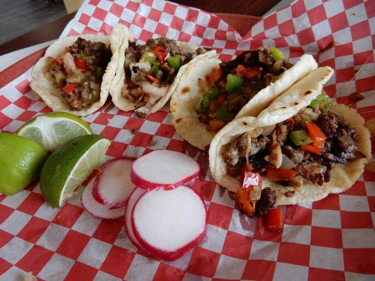 Alambre tacos with bacon and beef at Las Meras Tortas are just $1.90 each.