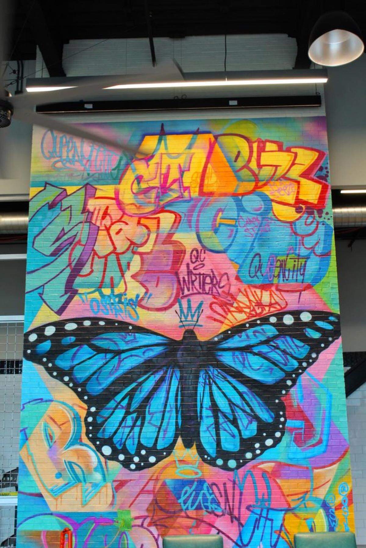 Photo by Jessica Swannie<br>Mural by Osiris Rain