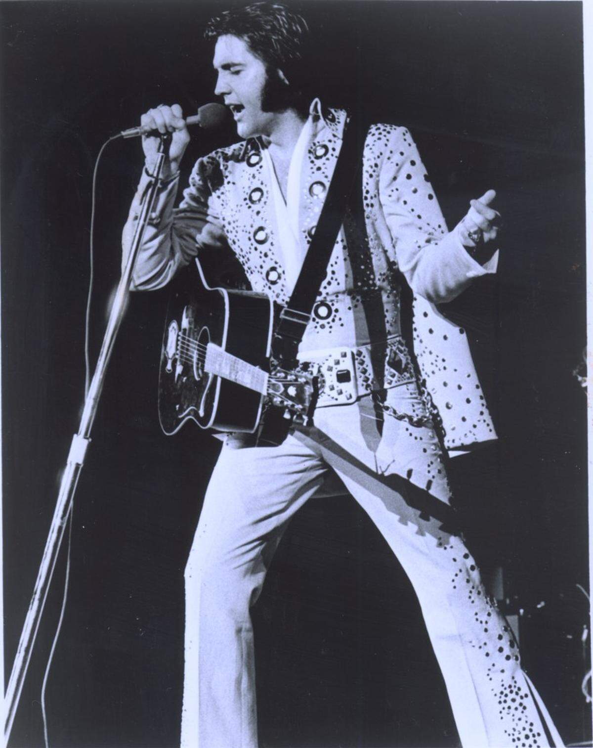 Elvis Presley in army attire. FILE 1976