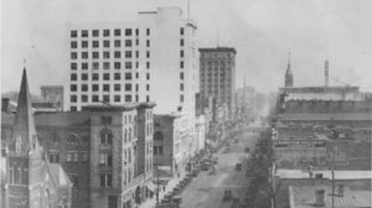 Looking north on Tryon St. from County Courthouse in mid-1920's.
House at lower right was home of Dr. Wilder. Johnston building (white structure at left) and Independence building (center) have not been expanded. Charlotte, N.C.
Charlotte Observer File Photo