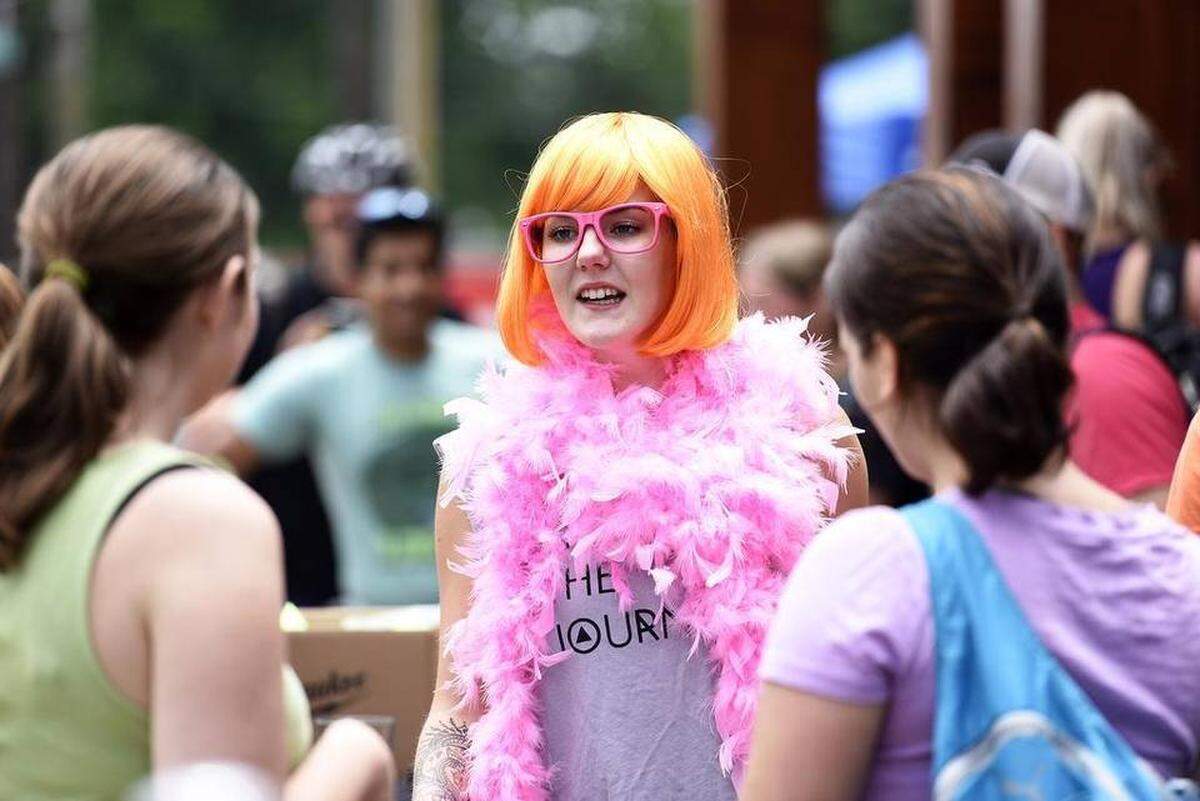 Wearing an orange wig and a pink boa, Ashley Turevon, was a colorful participant in the no-pants bike ride.