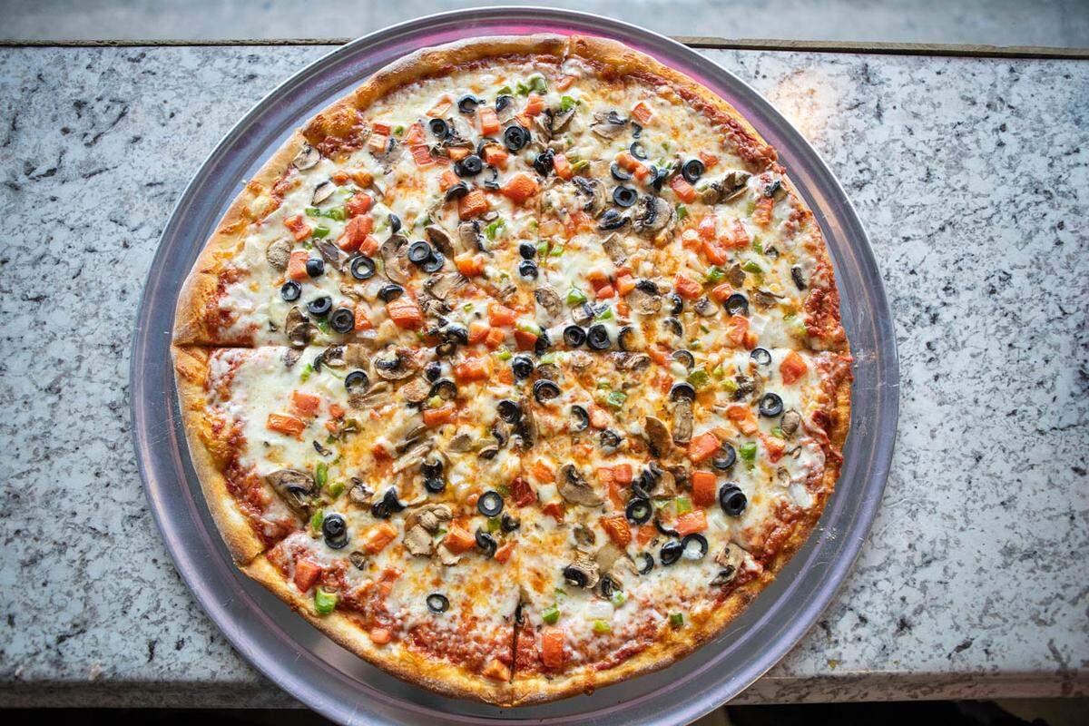 Photo by Alex Cason<br />Veggie pizza from Chi's Pizza
