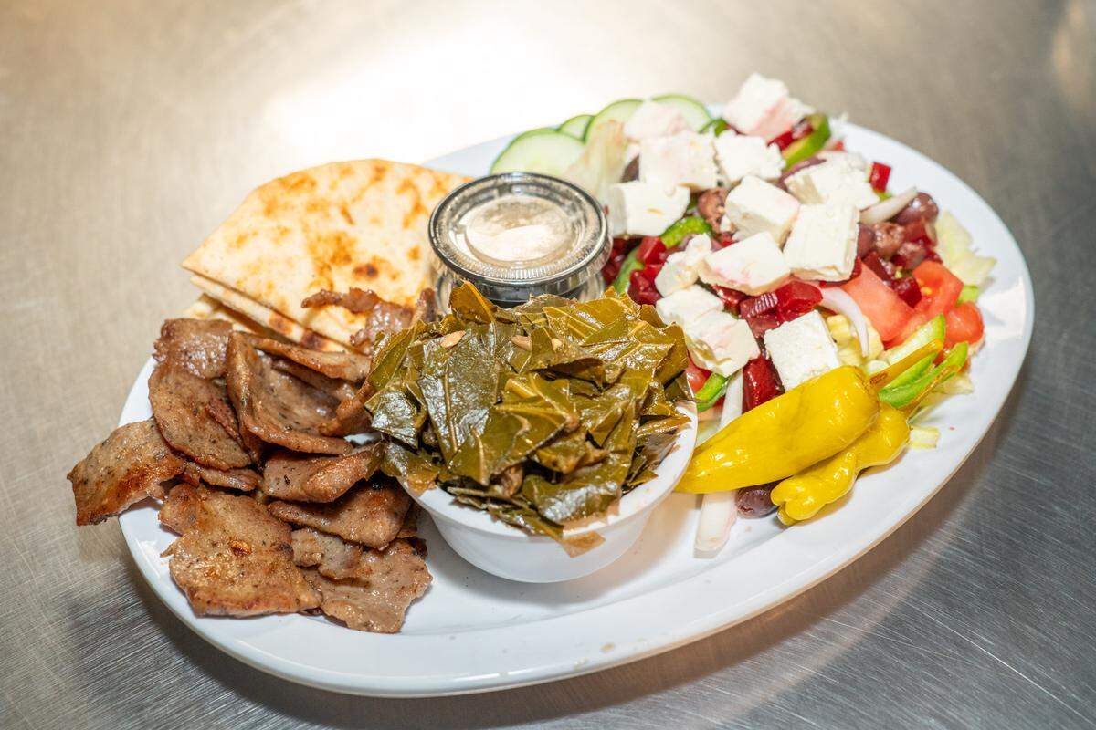 The Diamond Restaurant’s Gyros Platter has lamb, lettuce, tomato, onions,  cucumbers, feta cheese, olives beets, tzatziki and pita bread. Side of collards.