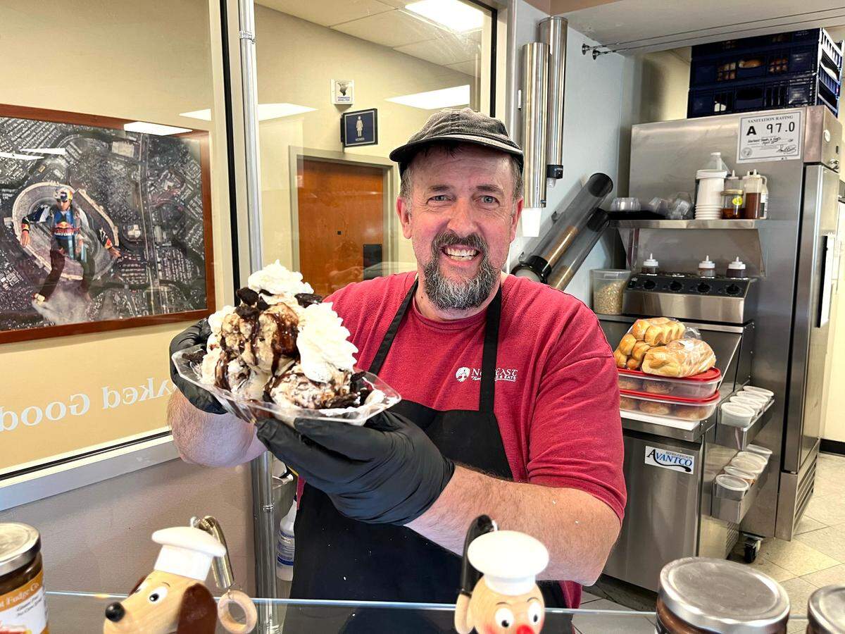 Blake Anderson holds a Mount Katahdin ice cream sundae at Nor’East Family Treats & Eats.