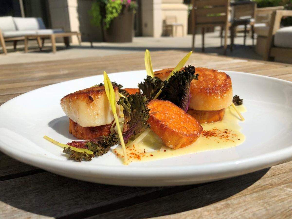 Courtesy of Oak Steakhouse<br>Smoked Scallops