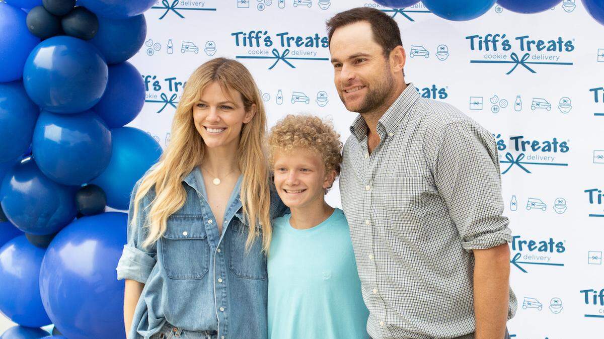 Alex Cason Photography<br/>Brooklyn Decker and Andy Roddick pose with a fan at the grand opening of Tiff's Treats at Waverly on Saturday, August 24.