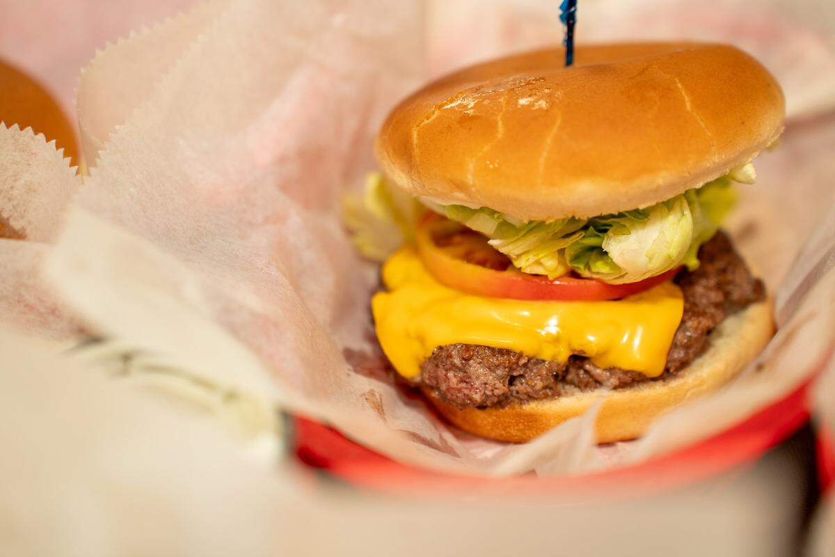 A small block burger with cheese at Diamond.