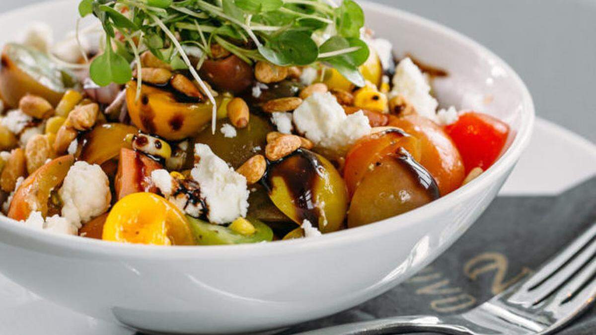 Courtesy of Nuvole Rooftop TwentyTwo<br>Heirloom Cherry Tomato Salad
