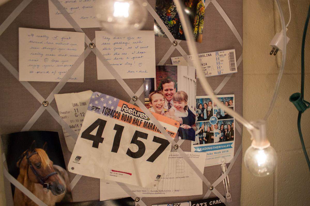 "I only knew my father with cancer." At the age of nine, Grace lost her father to cancer. Over her desk at UNC, where she is studying biology and pyschology on a pre-med track to be an oncologist, hangs a picture of her late father and an old race bib. His memory gives new importance to each mile she'll run this summer.