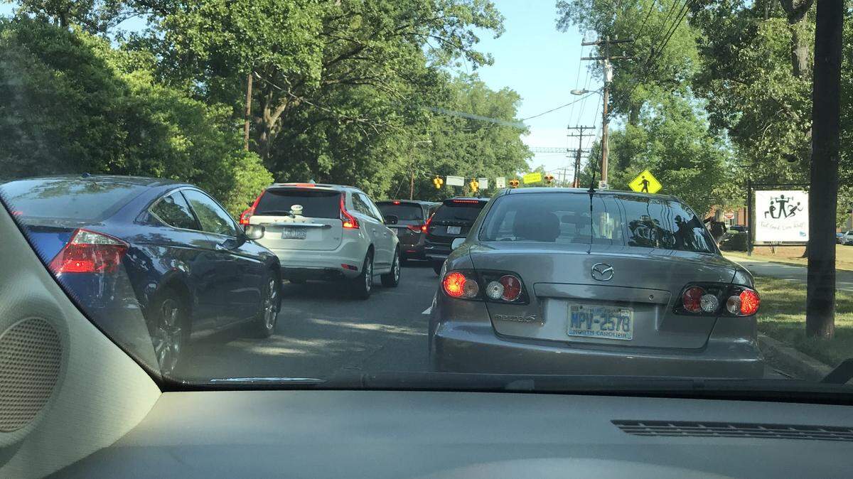 A nice long line of cars waiting on Providence.