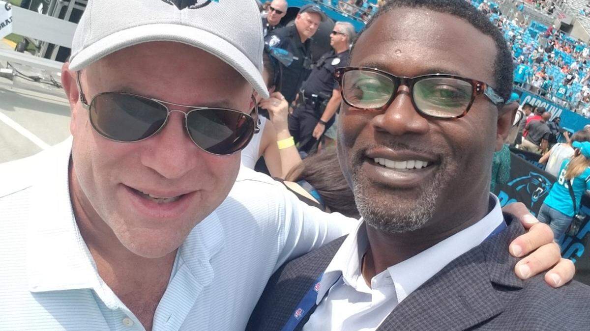 Courtesy of Muhsin Muhammad<br>Panthers owner David Tepper, left, and Muhsin Muhammad