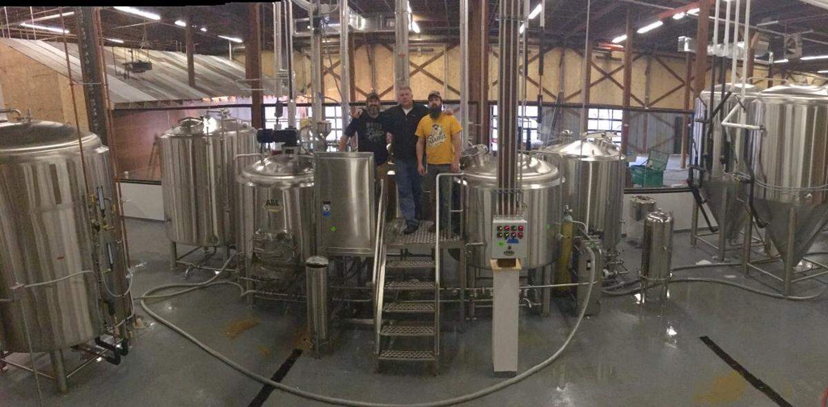 From left: Brewmaster Jason McKnight, Steve Steinbacher, Operations and Distribution Director Mark Thompson of the Cabarrus Brewing Company.