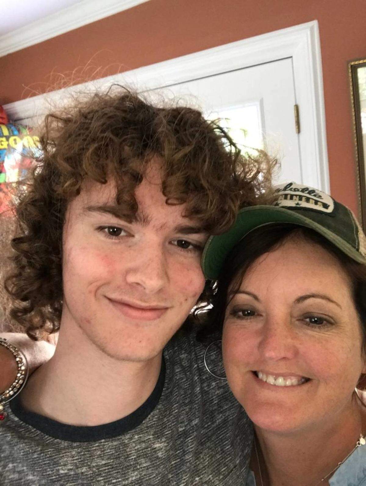 Courtesy of the Parlier family<br/>Reed with his mother, Julie Parlier.