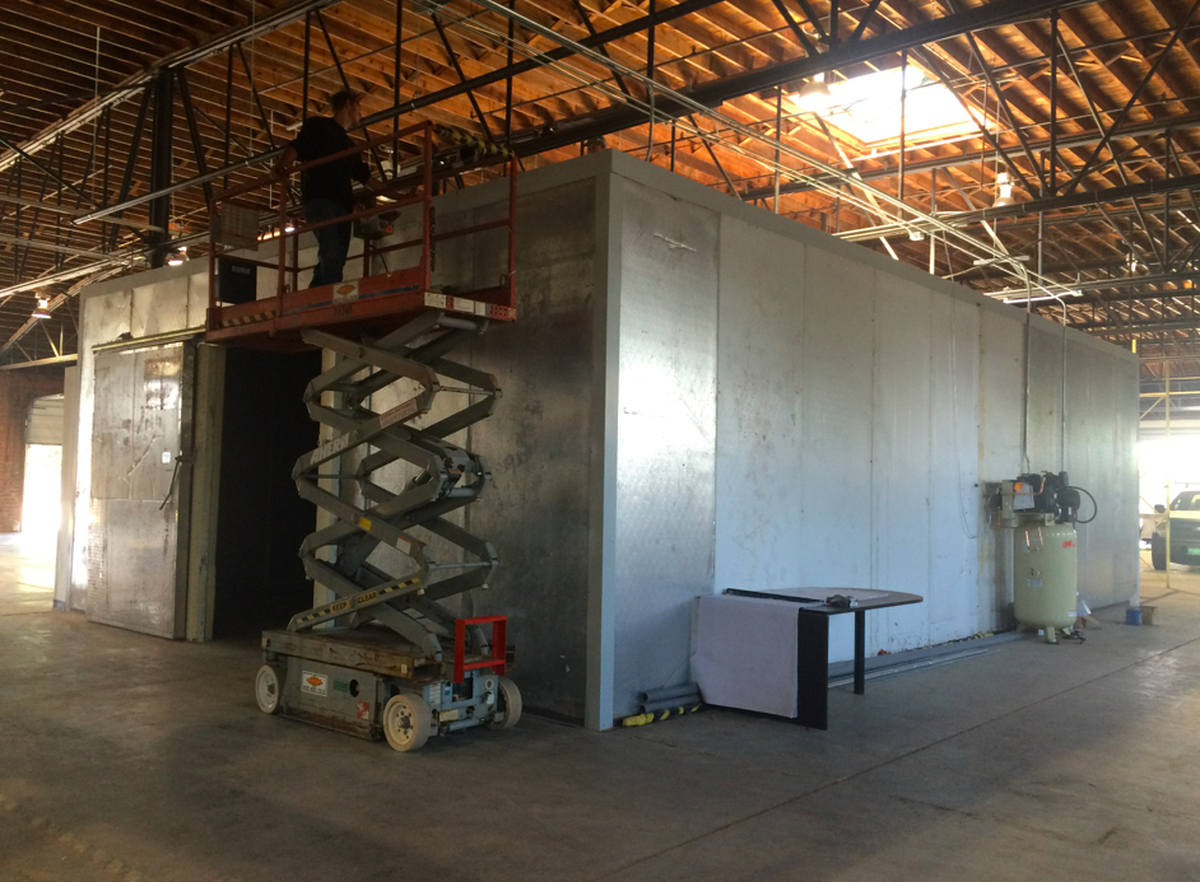 Walk-in cooler to store beer kegs and bottles for distribution