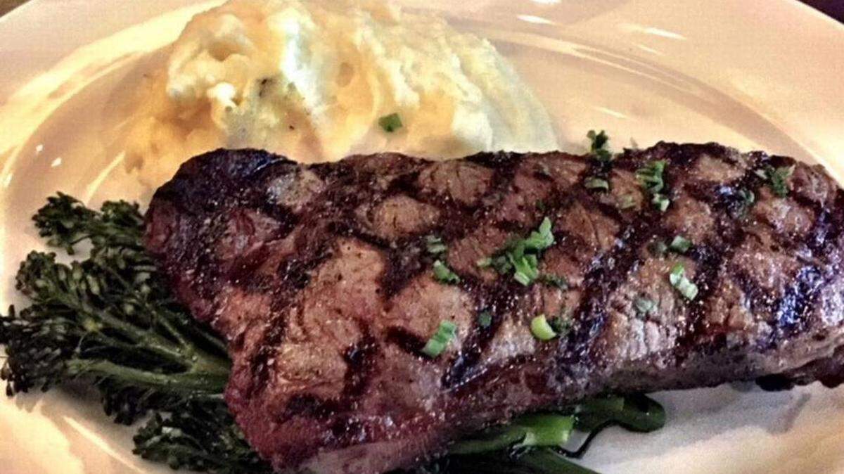 South Park Grill’s 14-ounce center-cut New York Strip is $37. Unlike other pricier steaks, it does come with potatoes and broccolini.
Photo by Kathleen Purvis