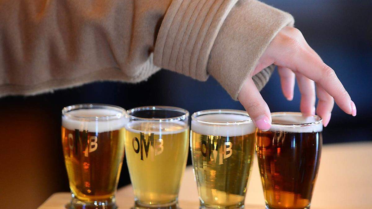 A customer samples the beer selection at the Olde Mecklenburg Brewery Thursday, Dec. 11, 2014.