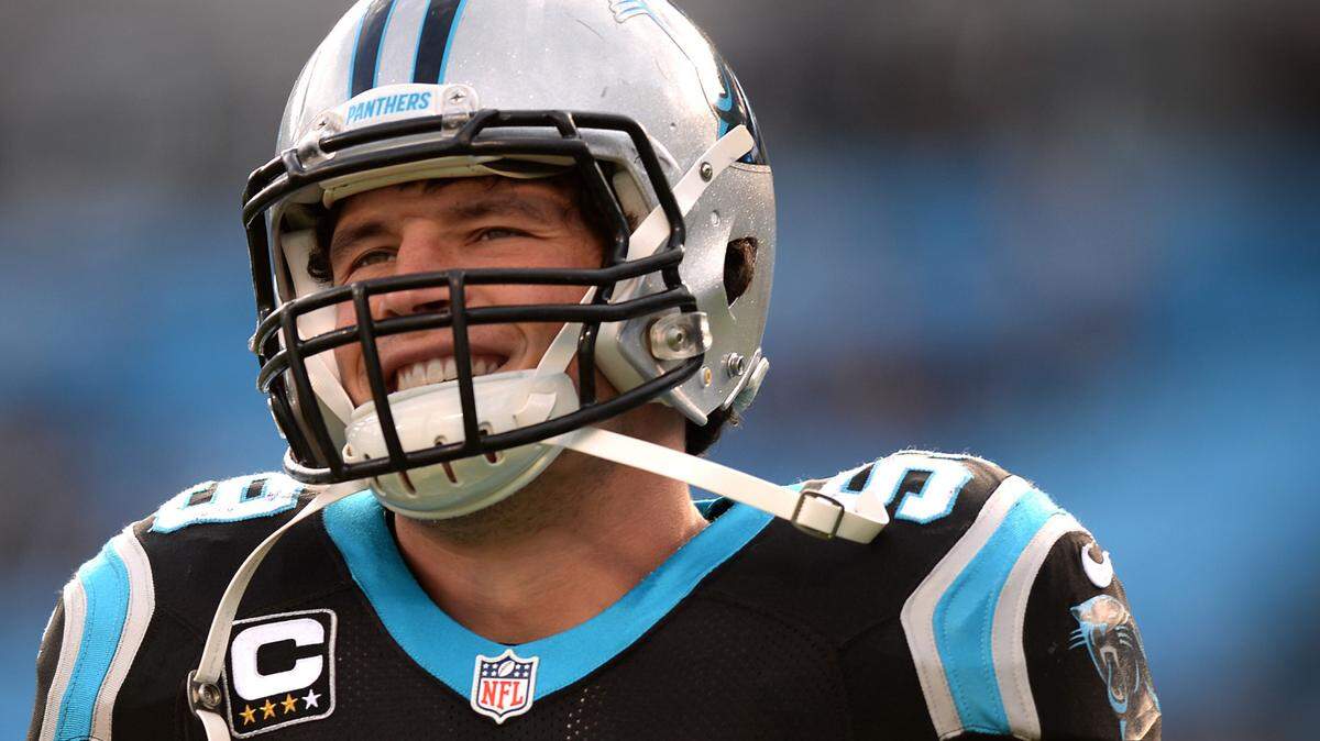 Carolina Panthers linebacker Luke Kuechly smiles as he warms up with his teammates prior to action vs the Tampa Bay Buccaneers on Sunday, January 3, 2016 at Bank of America Stadium in Charlotte, NC.