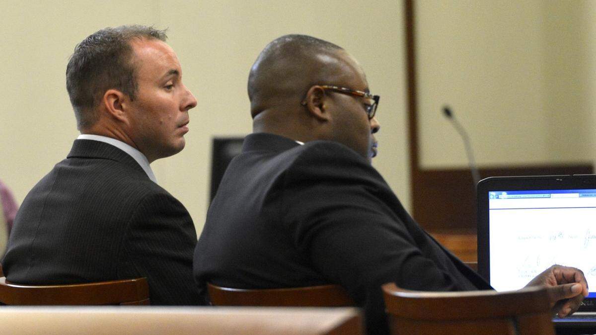 Former CMPD officer Wes Kerrick with attorney Michael Greene  during the first day of his trial for killing Jonathan Ferrell, July 20, 2015. 

Kerrick is charged with voluntary manslaughter in the shooting death of 24-year-old Jonathan Ferrell on September 14, 2013, along Reedy Creek Road. Ferrell was unarmed and shot ten times.