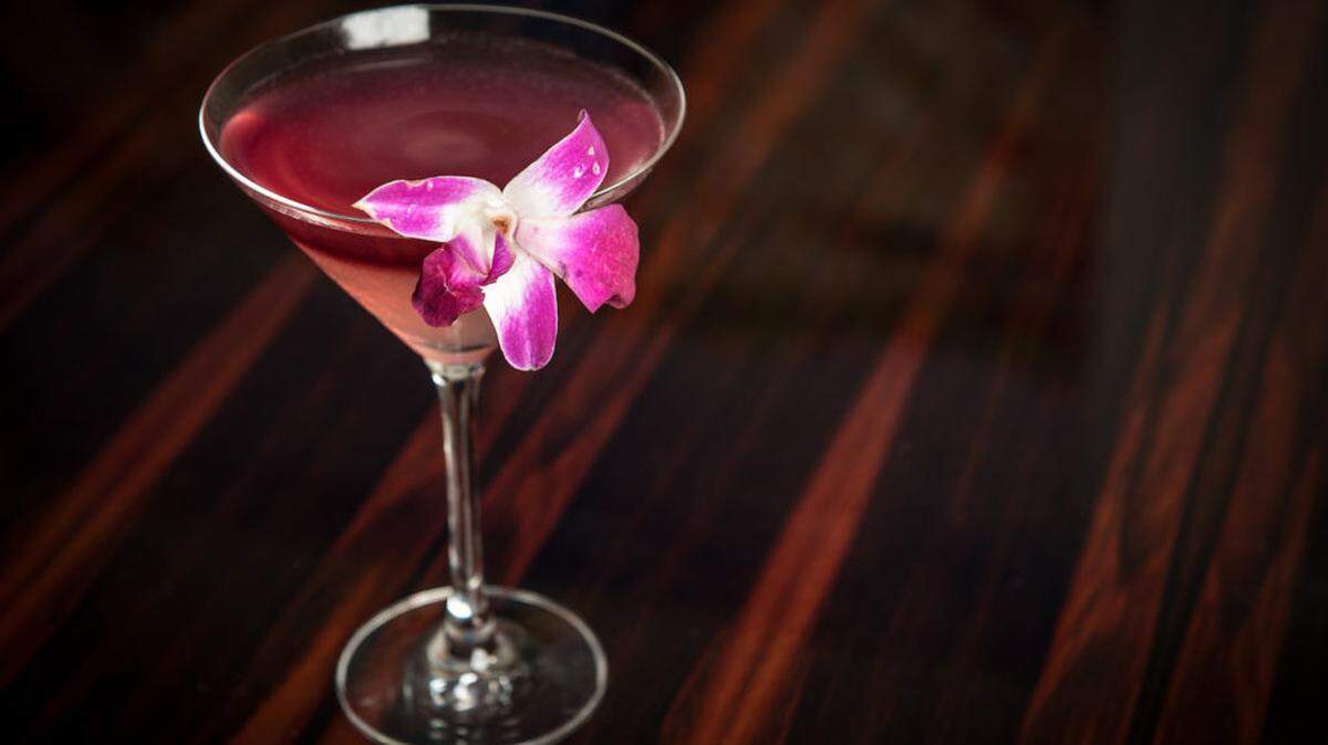 The "Always Have Peach-Other" features limoncello and Ciroc Peach Vodka, lemon juice, and a red wine float with a floral garnish.