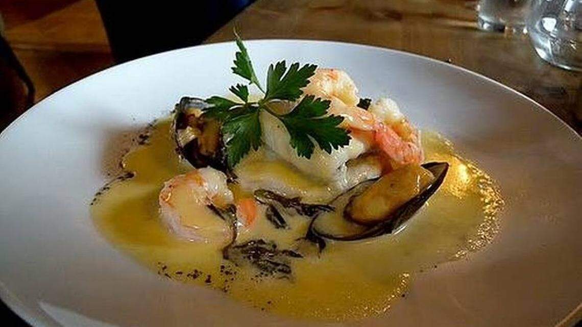Lumiere in Myers Park was known for elegant presentations of French-inspired food, like slow-cooked turbot with shrimp and mussels. Observer file photo