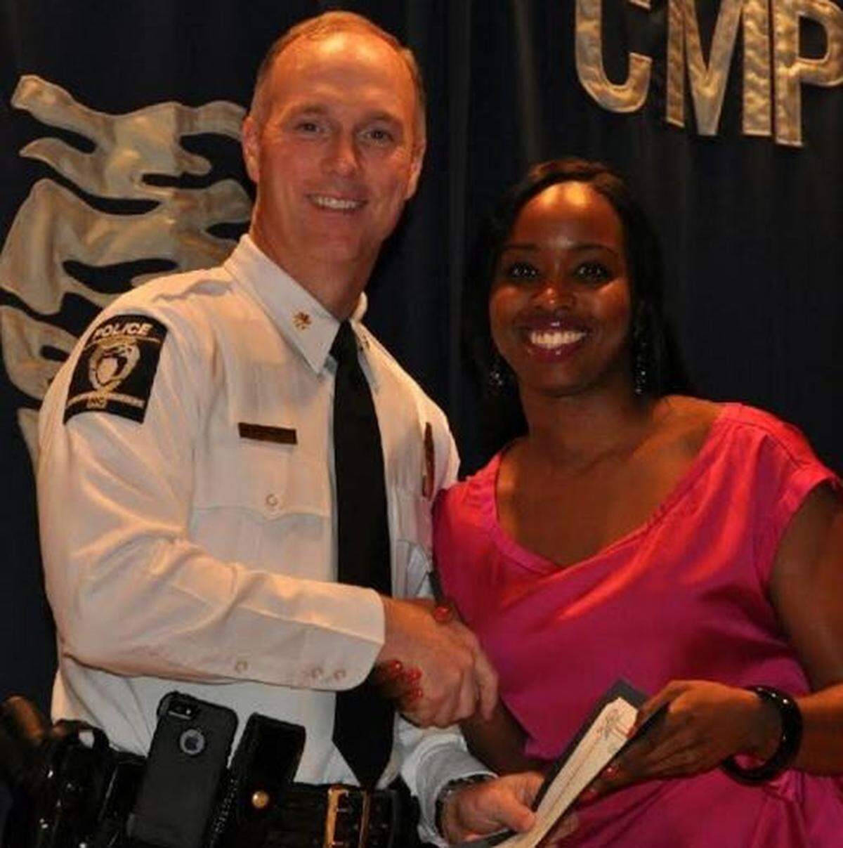 CMPD Major Mike Adams with Rebecca Jordan
