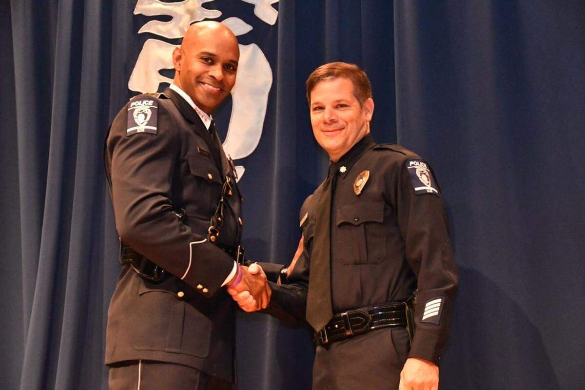 Major Mike Campagna, right, with CMPD Chief Kerr Putney