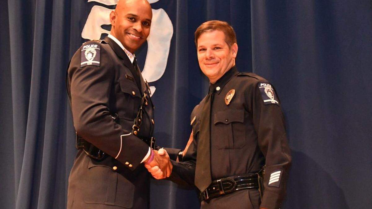 Major Mike Campagna, right, with CMPD Chief Kerr Putney