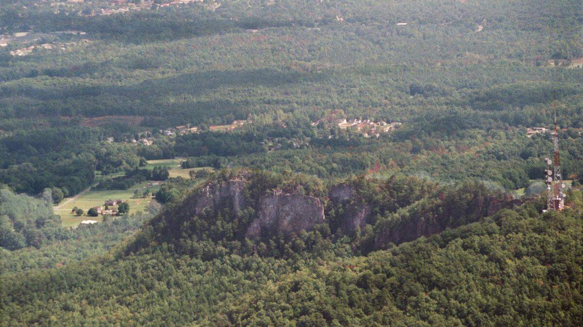 9/26/00: An aerial photo of Crowder's Mountain 
State Park (in foreground, Gastonia in background) in Gaston County. (JOHN D. SIMMONS/ STAFF)