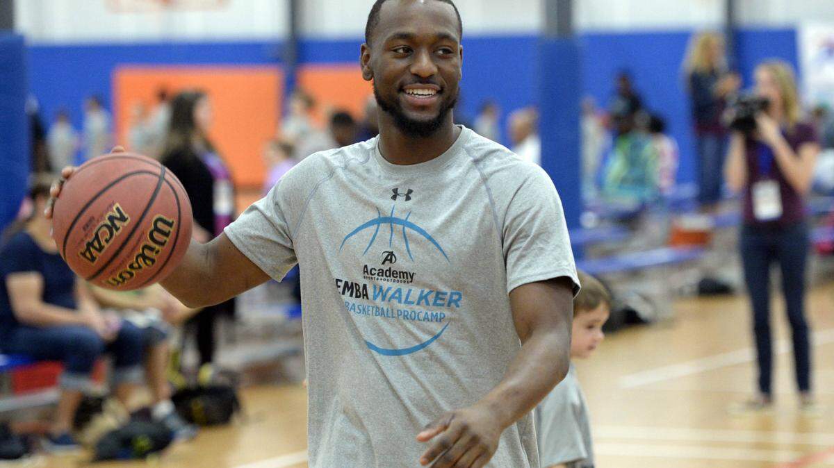 Charlotte Hornets starting point guard Kemba Walker smiles as he interacts with campers at the Kemba Walker Basketball ProCamp at Carolina Courts on Thursday, July 16, 2015. Despite the excitement about Jeremy Lin, Walker remains the Hornets best point guard -- and maybe best player.