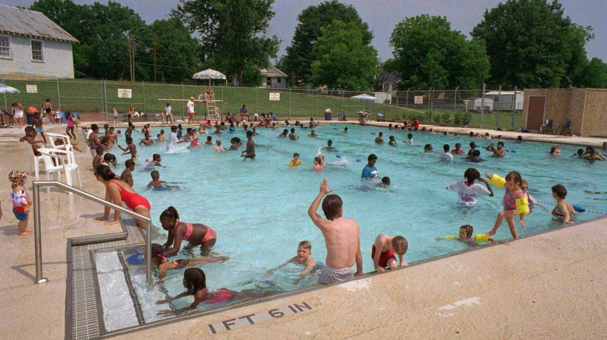 6/15/95 10K  THE WATER'S FINE: A hot, humid day draws a crowd to the McInnis Aquatic Center in Concord. It's operated by the City of Concord and is open 1-6 p.m. Tuesdays-Saturdays and 2-6 p.m. Sundays.   (UNPUBLISHED NOTES:)   (6/11/95 G.SMITH) A hot, humid day draws a crowd to at the McInnis Aquatic Center in Concord. Christopher A. Record/staff