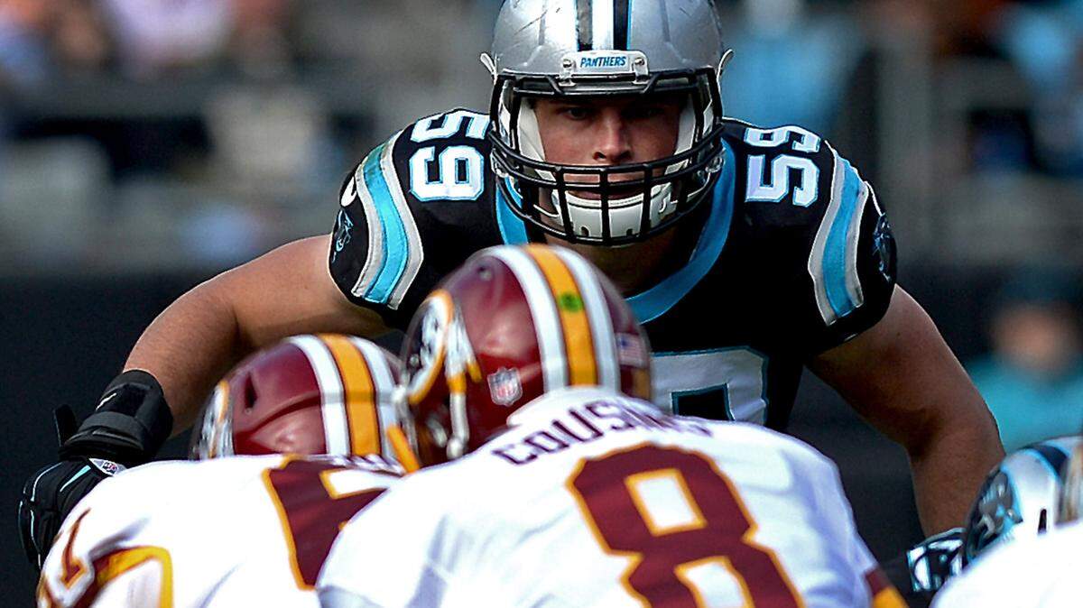 Carolina Panthers linebacker Luke Kuechly glares over the Washington offensive line at quarterback Kirk Cousins during first quarter action at Bank of America Stadium in Charlotte, NC on Sunday, November 22, 2015.