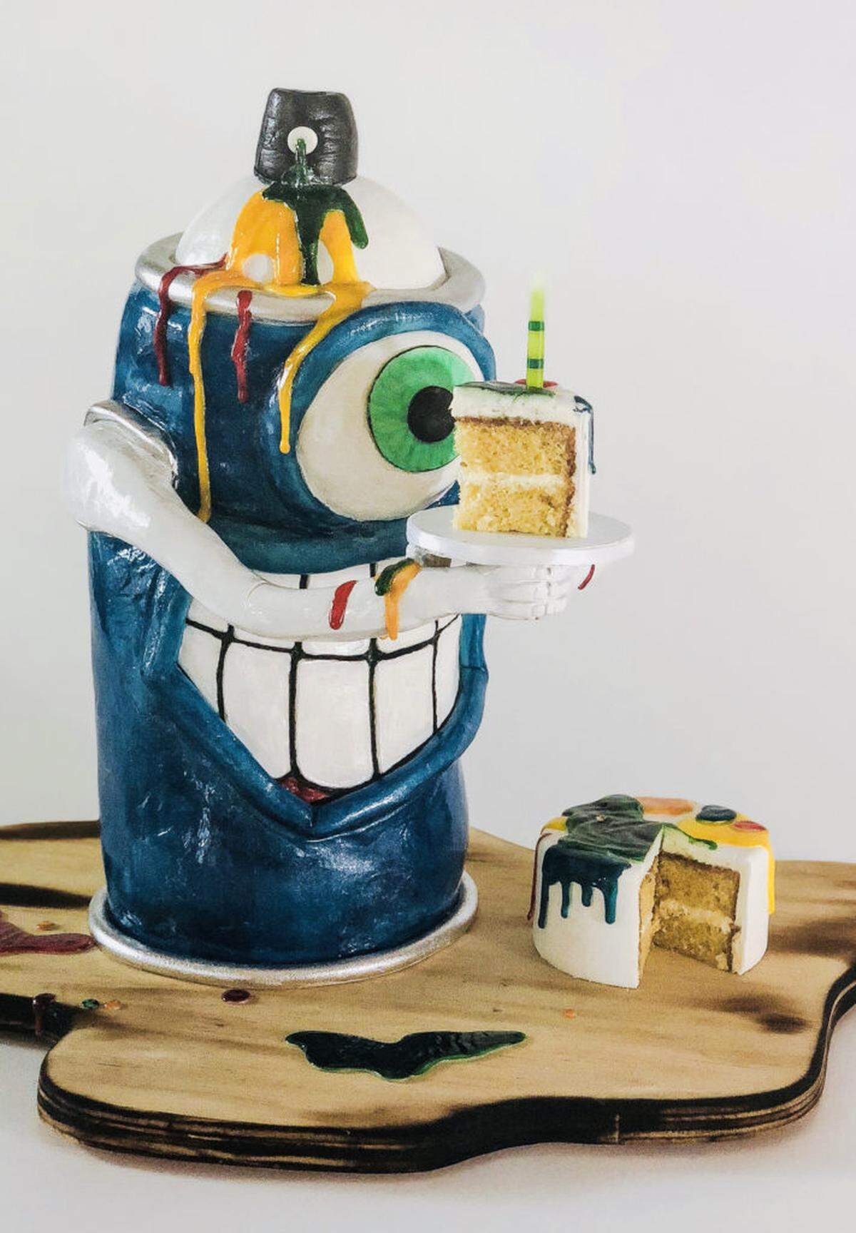 Ella Stone of Celestial Cakery designed this spray paint can groom's cake for local muralist and artist Matt Moore, aka "Puck McGruff." Photo courtesy of Celestial Cakery.