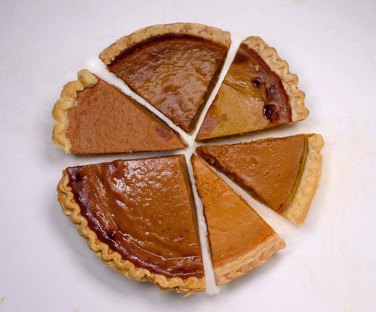 Need a photo to go with a story on tasting six prepared pumpkin pies. I'd like to take a slice of each and photograph them from above, placed together as a single pie. Bottom left clockwise are Whole Foods (the big piece), Harris Teeter, Fresh Market, Publix, Trader Joe's and Costco (front right).