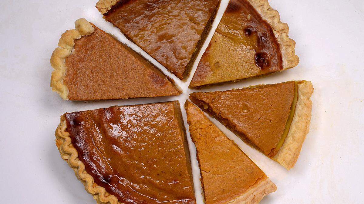 Need a photo to go with a story on tasting six prepared pumpkin pies. I'd like to take a slice of each and photograph them from above, placed together as a single pie. Bottom left clockwise are Whole Foods (the big piece), Harris Teeter, Fresh Market, Publix, Trader Joe's and Costco (front right).